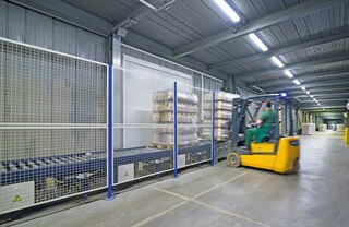 Les grillages de sécurité périphérique délimitent les zones à risque du circuit de convoyage