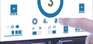 La fonction de changement de sens permet de choisir le côté du rayonnage où l'on veut travailler